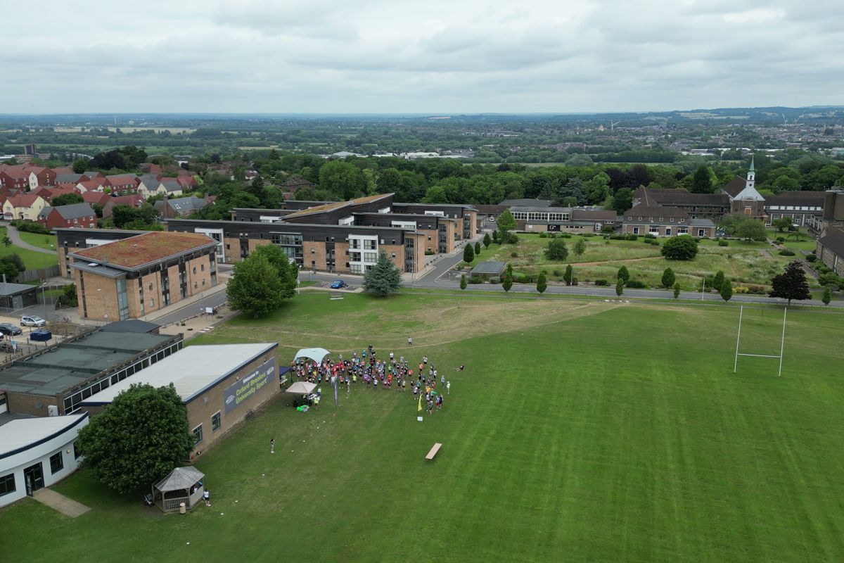 Aerial view over the campus roofs to the Oxford skyline